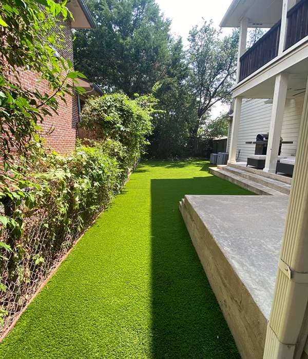 Artificial grass installation for residential landscape